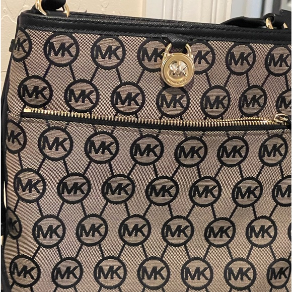Michael Kors black and tan crossbody purse - Picture 1 of 6